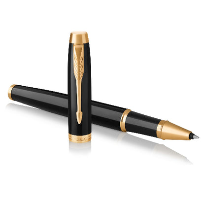 Black and gold pen set on a white background